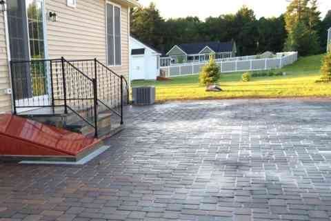 Custom stone patio built by Eddy's Construction